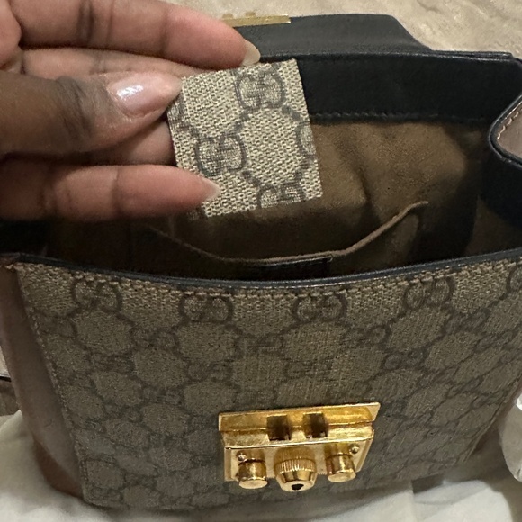 Gucci Padlock Backpack in GG Supreme canvas with leather trim